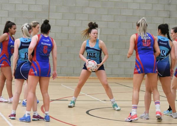 Netball - Oaksway (lt blue) v Oldham (blue/red) at Brierton Sports Complex, Hartlepool.