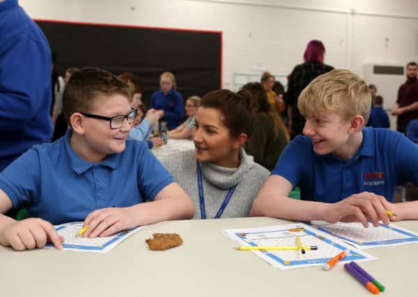 Brandon Phillips and Lewis foster with Amy Wakefield during Catcote Academy's Fairtrade coffee morning. Picture: TOM BANKS