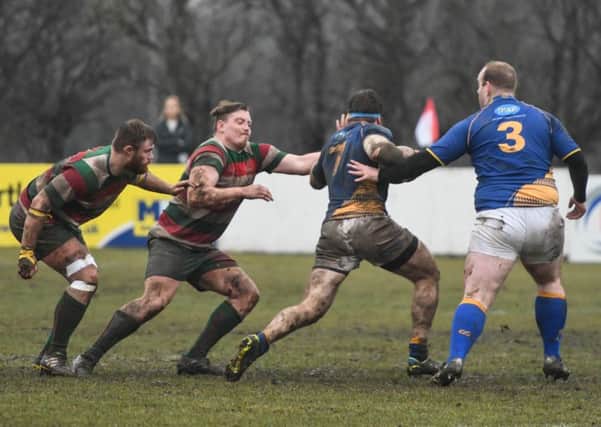 West Hartlepool try to keep Alniwck at bay.