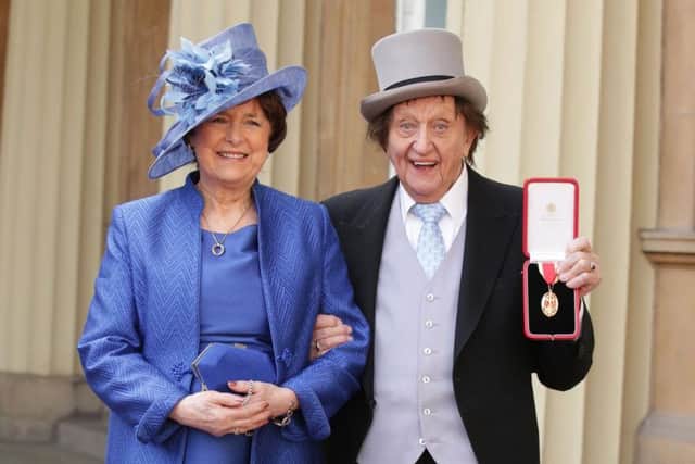 Sir Ken Dodd with his partner Anne at Buckingham Palace after he was made a Knight last year. She became his wife two days before he died.