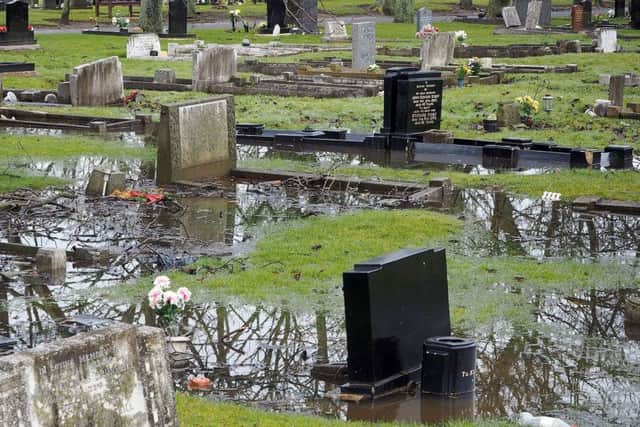 Waterlogged graves in Stranton Cemetery. Picture by FRANK REID