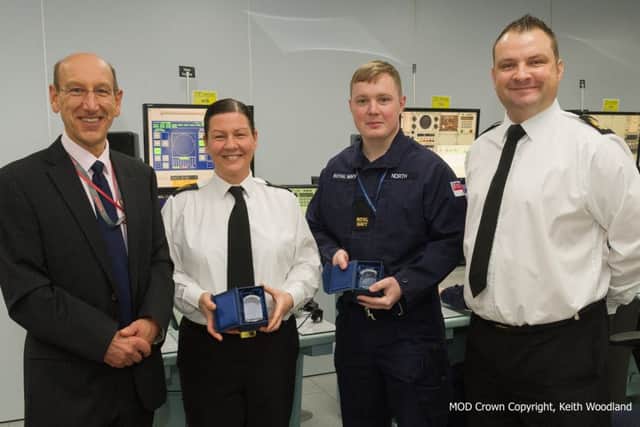 From left, BAE Systems Training Delivery Manager Ian Carter, Petty Officer Amanda Tinson, 10,000th trainee Able Seaman Matthew North and Warrant Officer Dean Button.