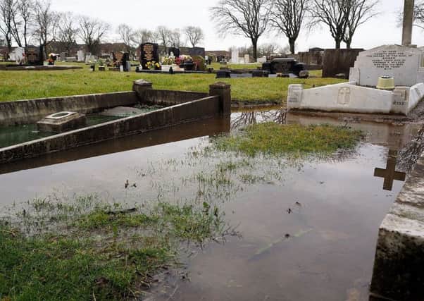 Waterlogged graves in Stranton Cemetery.