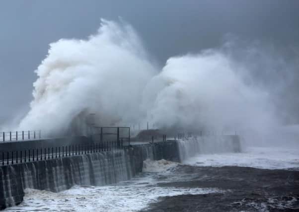 The Heugh Breakwater takes a battering during stormy weather. Picture: TOM BANKS