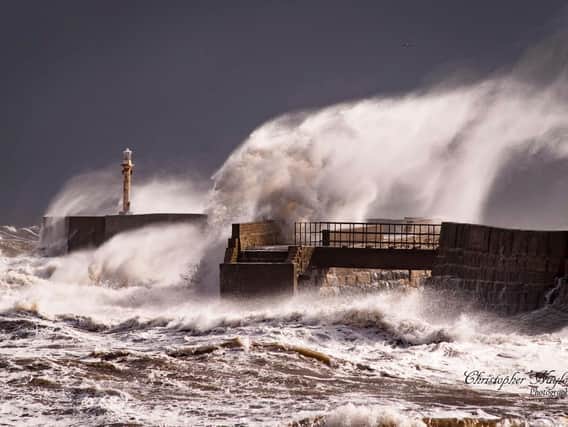 Waves crashing over Hartlepool's Middleton pier. Photo by Chris Naylor
