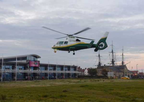An Air Ambulance taking off from waste ground behind the Mecca Bingo in Hartlepool