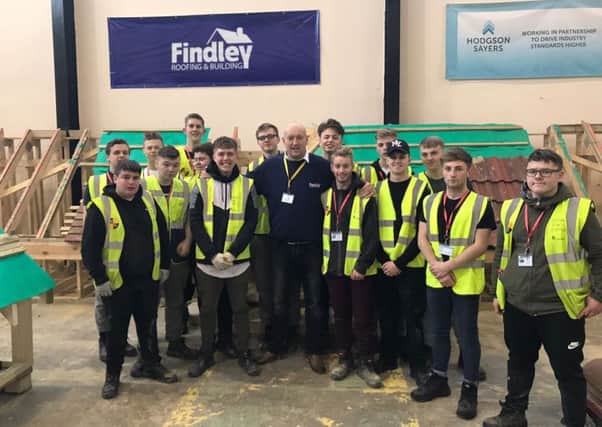 New apprentices with Findley Roofing & Building director Grant Findley (centre).