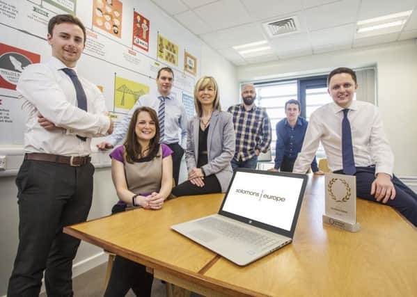 Joan Cook of UK Steel Enterprise (fourth from left) with members of the Solomons team at Hartlepool (from left) Ryan Dodds, Victoria Clements, Ian Hedley, Andy Catterson, Richard Newton and Josh Brown.