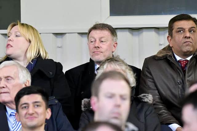 Potential new director of football Craig Hignett sits between current chief executive Pam Duxbury (right) and prospective owner Raj Singh.