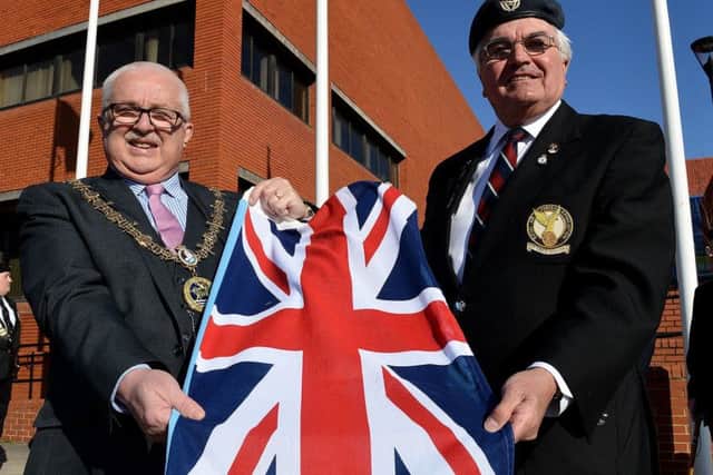 Mayor of Hartlepool Councillor Paul Beck is presented with the RAF ensign flag by David Stacey to commemorate 100 years of the RAF. Picture by Frank Reid