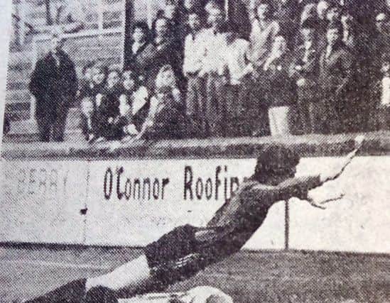 Paul Dobson wins a penalty for Pools against Rochdale.