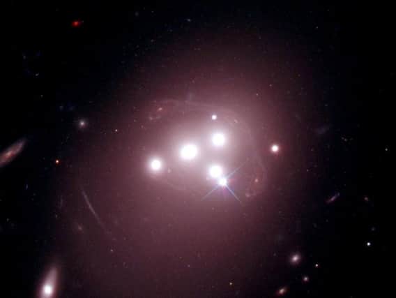 NASA/ESA Hubble Space Telescope photo issued by Durham University of the rich galaxy cluster Abell 3827, as researchers are back in the dark over what dark matter could be, after new observations cast doubt on a previous breakthrough.