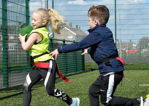 Tag rugby taking place during a Commonwealth Games themed sports event held at Brierton Sports Centre. Picture by FRANK REID