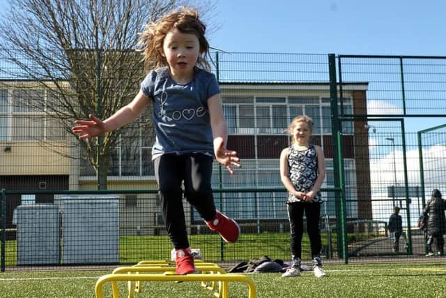 Ramona Webb (4) jumping ad she took part in the Commonwealth Games themed sports event held at Brierton Sports Centre. Picture by FRANK REID
