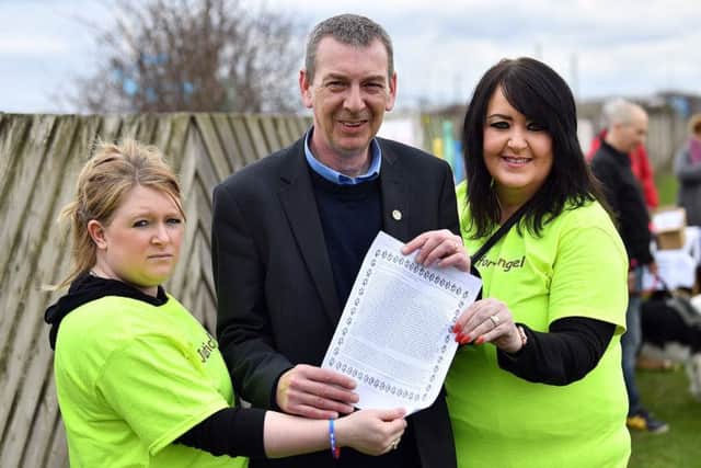 Hartlepool MP Mike Hill with Justice for Angel group members Jenna Davies (left) and Lynn Williamson