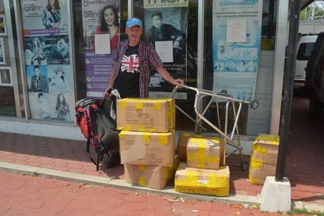 Michael with a batch of donations.