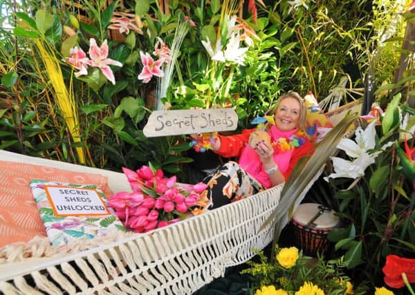 From drab shed to tropical paradise - Fiona Fisk (Floral Pavilion Co-ordinator for Harrogate Flower Show) unlocks the new Secret Sheds attraction.