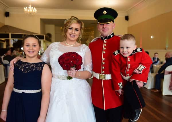 Irish Guardsman Mark Cantwell and his bride Janine King at their reception at  AVenue, in Hartlepool with their children Lexi (9) and Henry (3)