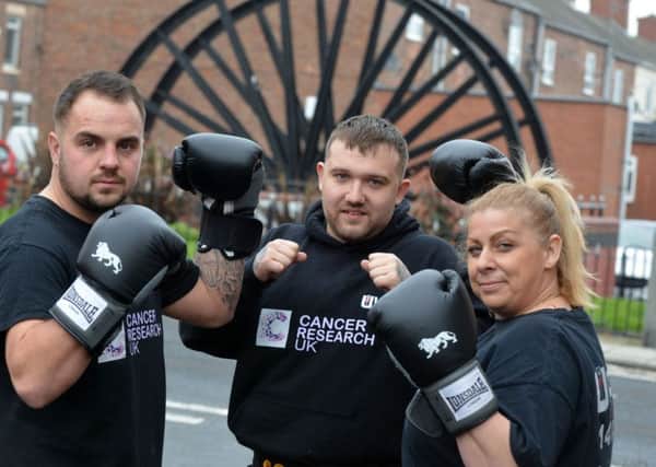 Cancer Research UK boxing challenge in memory of Julie Dargue.
From left Chrissy Bell, Harry Cox and Julie's sister Claire Hardy
