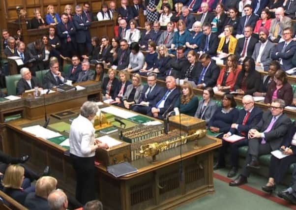 Theresa May addresses MPs