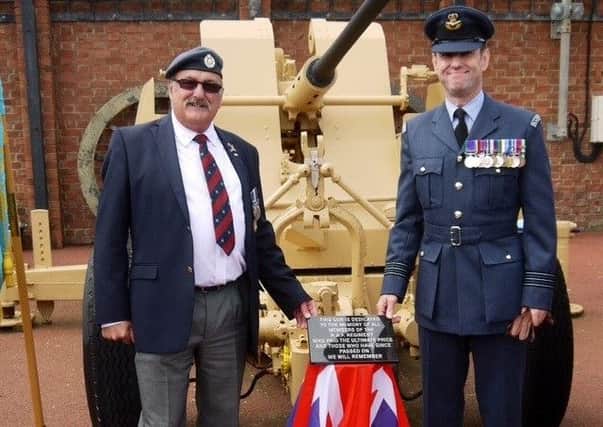 Volunteer Wally Stewart (left) with Wing Commander Milsom when  the plaque on the memorial was unveiled.