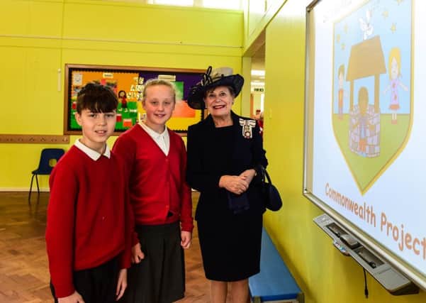 The Lord Lieutenant of County Durham, Sue Snowdon, with head boy and head girl, Toby Smith and Hannah Verrall at St Helen's Primary School.