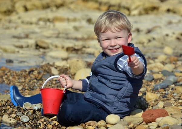 Sun and high temperature on Hartlepool Headland. Youngster James Skinner, 3