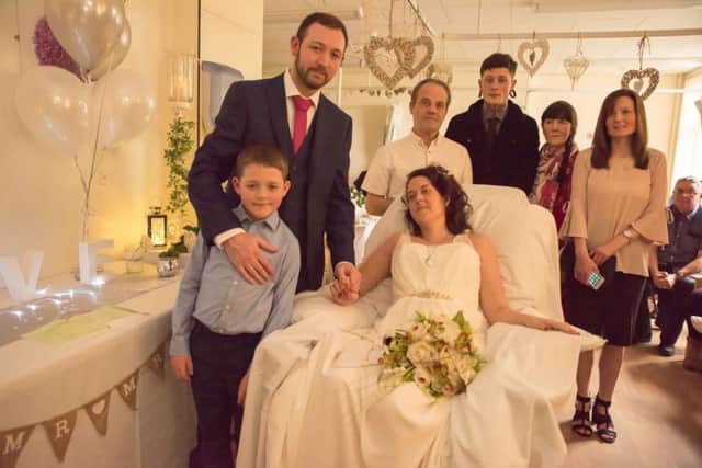 Tracey and Steven Keers on their wedding day with son Kieran.