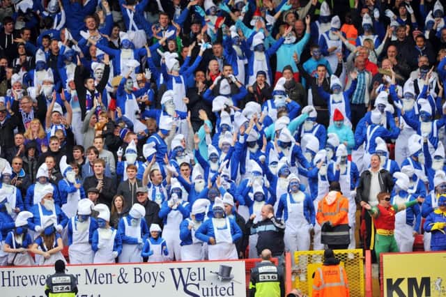 Smurfs in the crowd during the game against Charlton. Picture by FRANK REID