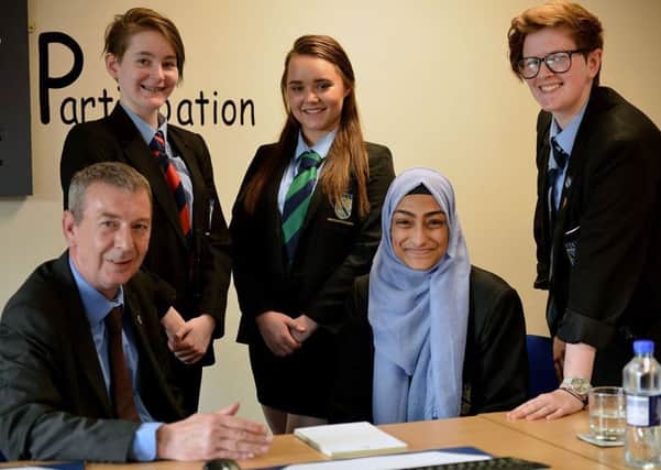Hartlepool MP Mike Hill with High Tunstall College of Science 'Mind Fighters' (left to right) Lauren Cowan, Lizzy Atkinson, Nafisa Azad and Emma Londesbrough. Picture by FRANK REID