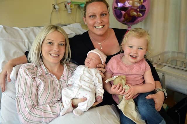 Ruth Thomas-Coxon (32) and her wife Lindsey with their daughter Aria Lil (2) and new born daughter Ivy Grace born at North Tees Hospital. Picture by FRANK REID