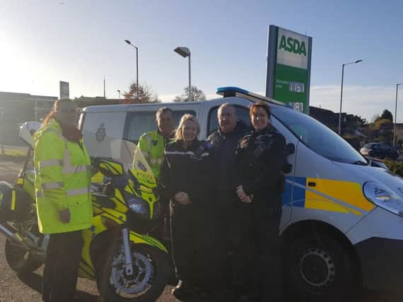 Finola Clarkson, of Asda petrol station in Peterlee, Sergeant Iain Rodgers from Durham Constabulary's bikes section, PCSO Lisa Hall, Durham County Councils petroleum enforcement officer Chris Matthews and PCSO Nicola Bowman.