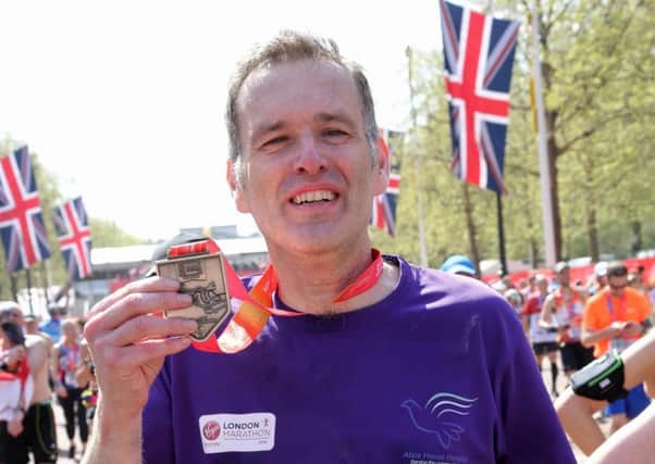 Alan Robson after finishing the London Marathon in 2018