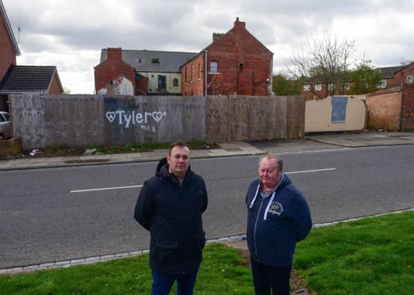 Councillors Stephen Akers-Belcher (left) and Allan Barclay at The Manor House, Owton Manor Lane, Hartlepool, which has been the target for vandals