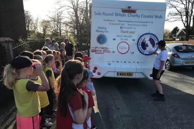 1st Easington Village Church Brownies and 1st Easington Village Rainbows are given a rundown of the journey so far by Jane Allen's husband Frank.