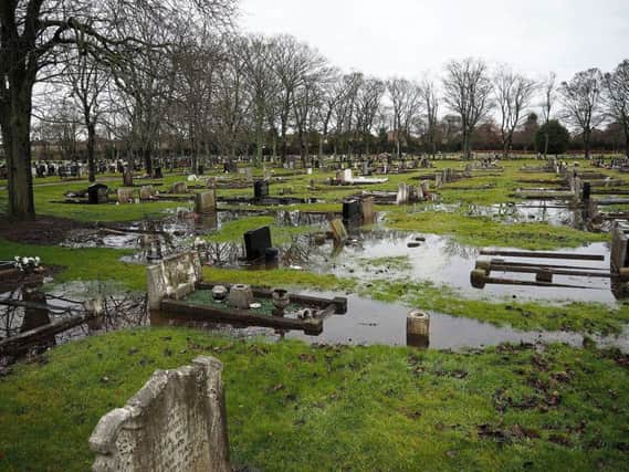 Waterlogged graves in Stranton Cemetery. Picture by FRANK REID