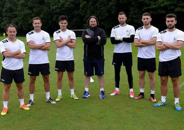 Former Hartlepool manager Craig Harrison (centre) with his summer signings (left to right)  Jack Munns, Blair Adams, Ryan Donaldson, Scott Loach, Jake Cassidy and Luke George. Picture by FRANK REID