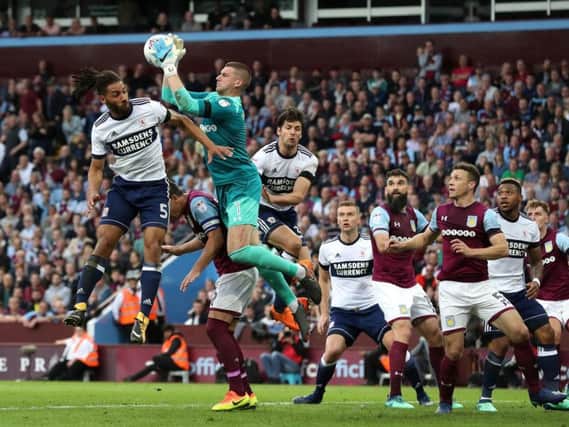Sam Johnstone claims the ball. PA Picture.