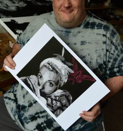 Andrew Forcer, of Park Road, Hartlepool who suffered from  Fibromyalgia, has written a song as at of a new double album to rise money for the treatment of the illness. Andrew is pictured with the album cover which he has painted.