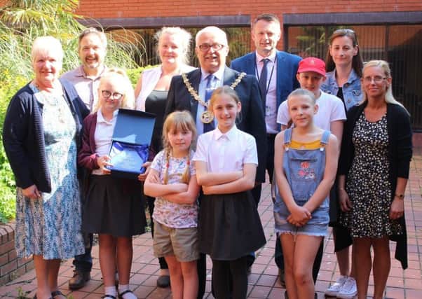 Jessica Stones (third left) and other members of The Seaton Beach Squad with the Mayor and Mayoress of Hartlepool, Tony Hanson (fifth right) and their parents.