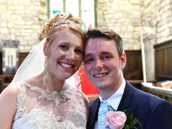 Rebecca Wilkie and Christopher Porritt in St Mary Magdalene Church Hart Village after their wedding. Pictures by Frank Reid