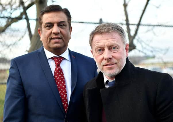 Hartlepool Uniteds owner Raj Singh (left) and director of football Craig Hignett (right).