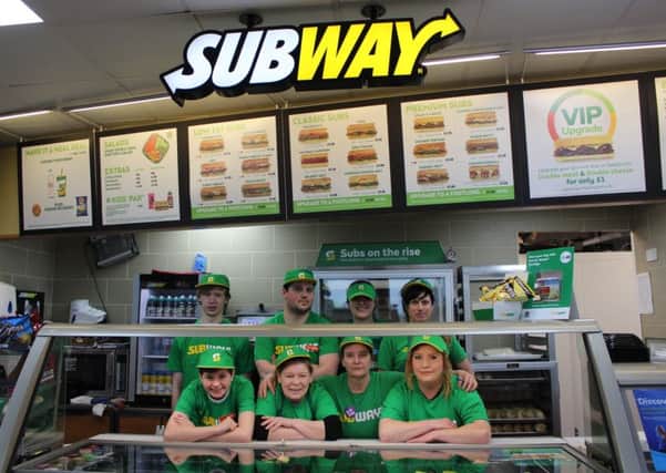 New apprentices with members of the Subway team.