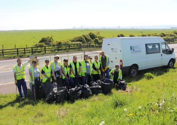 A team of Hartlepool Borough Council countryside volunteers and local Tesco staff joined forces to help tidy up verges along Tees Road.