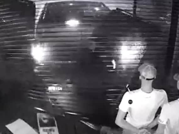 CCTV footage shows a white van being reversed through the window of JD Sports in the ram raid at Teesside Retail Park. Pic: Cleveland Police.