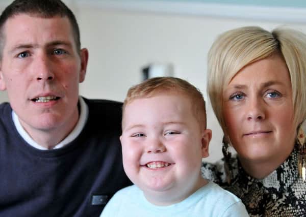 Leyton Anderson with his mum Dawn and dad Jamie Rowbotham. Picture by FRANK REID