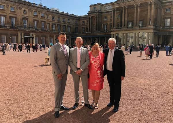 From left: Andrew Martin-Wells, Coun Ray Martin-Wells, Coun Brenda Loynes and Dennis Loynes at Buckingham Palace.