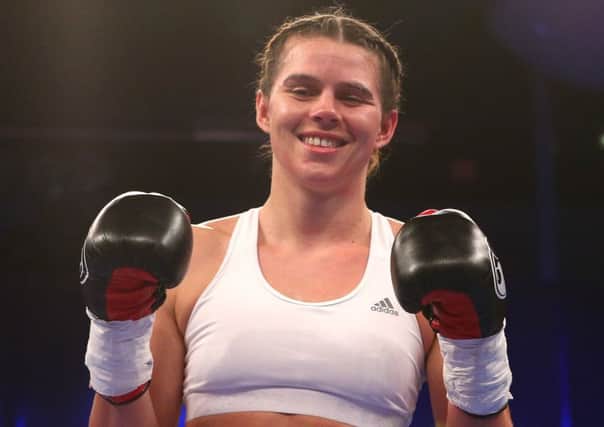Savannah Marshall celebrates beating Ester Konecna during their Super middleweight bout at the Bolton Whites Hotel, Bolton.